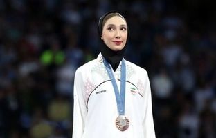 جشن تولد مبینا نعمت زاده کنار دو غول وزنه برداری ایران | مبینا نعمت‌زاده و حسین رضازاده شمع تولدشان را باهم فوت کردند